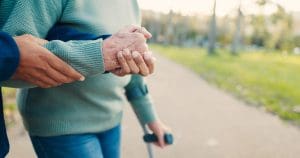 person assisting elderly